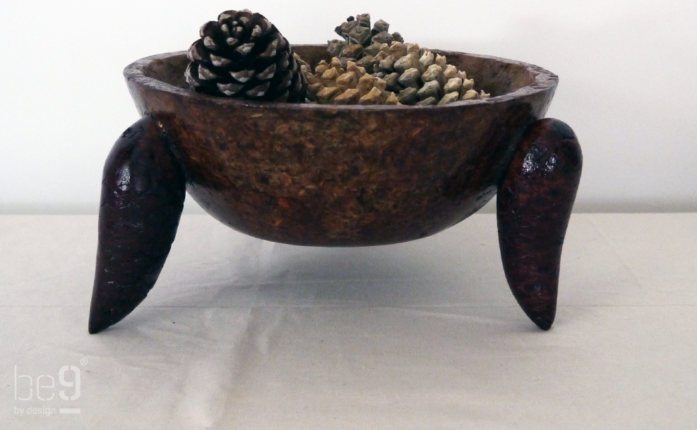 Dome shaped pine chip bowl with pine cones